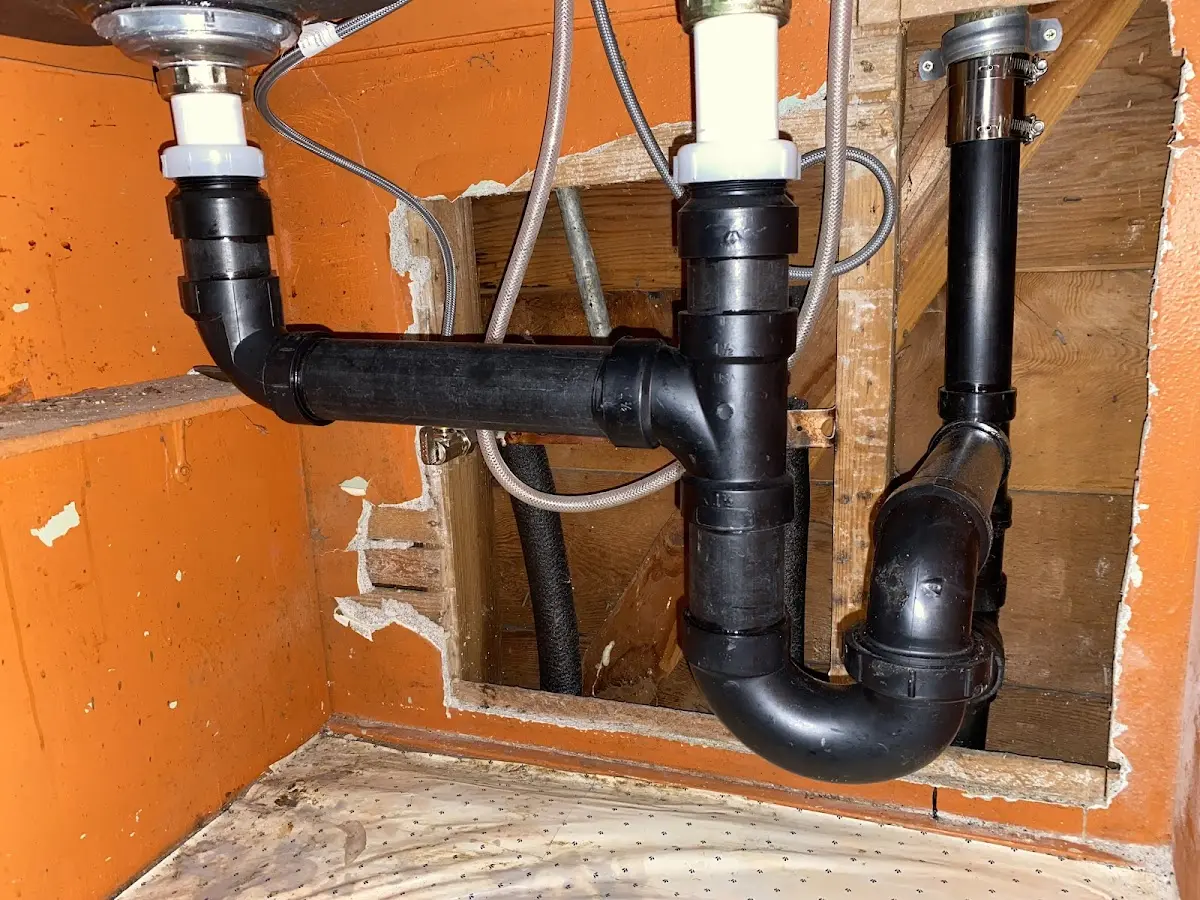 Professional Garbage Disposal Repair equipment and tools on the job in Fort Bragg